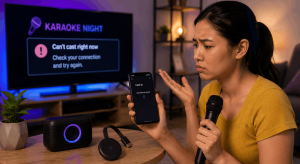Woman troubleshooting a karaoke app that cannot cast to Chromecast while holding a microphone and phone near her TV.